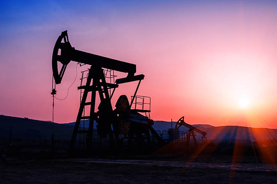 Built for the Toughest Jobs: Parmelee Wrenches Redefine Durability in Oil Fields; oil pump silhouette on the beautiful red sunset